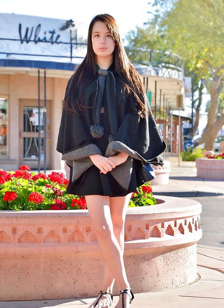 Svelte brunette youthful Pamela Aeris showing small tits and playing with sex toy outdoor