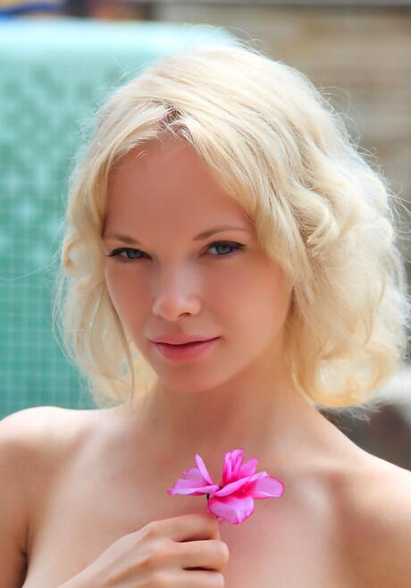 Luscious blond young Feeona A in nasty foot fetish action outside