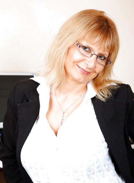 Stunning mature Alex in hot pantyhose reveals big boobies and spreads her legs in office